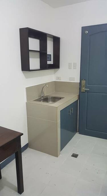 Room has a Desk for Working Space & Kitchen Sink