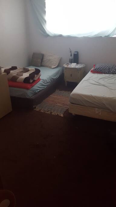 Two double beds with comfortable mattress pads