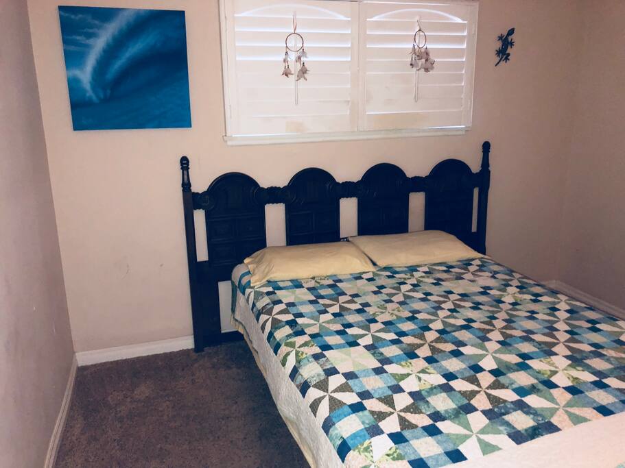 Bedroom with queen size adjustable vibrating bed and full bath, with bathtub and shower, attached.