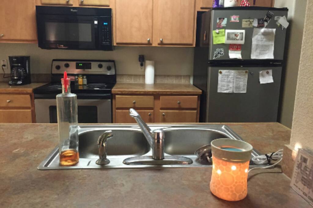 A warm kitchen where you are welcome to cook meals or use the microwave if desired.
