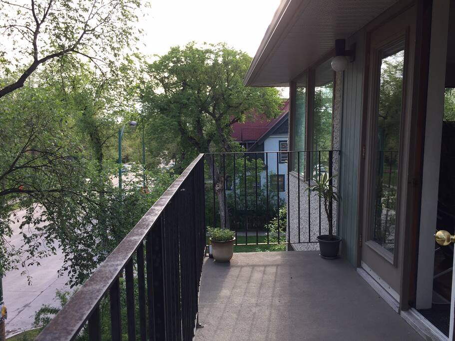 Front Balcony overlooking River Ave!