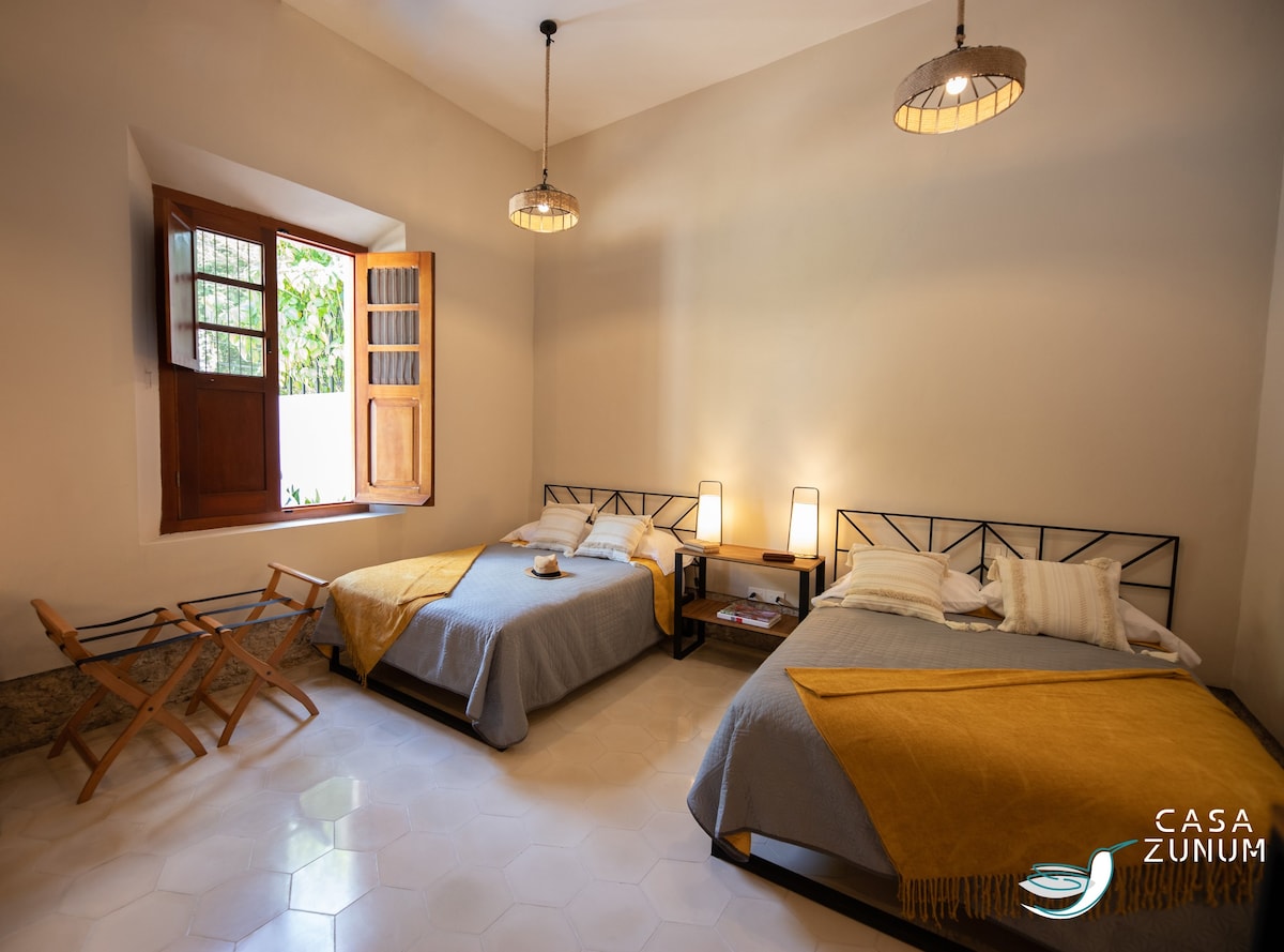 Comfortable full size beds in Twins room