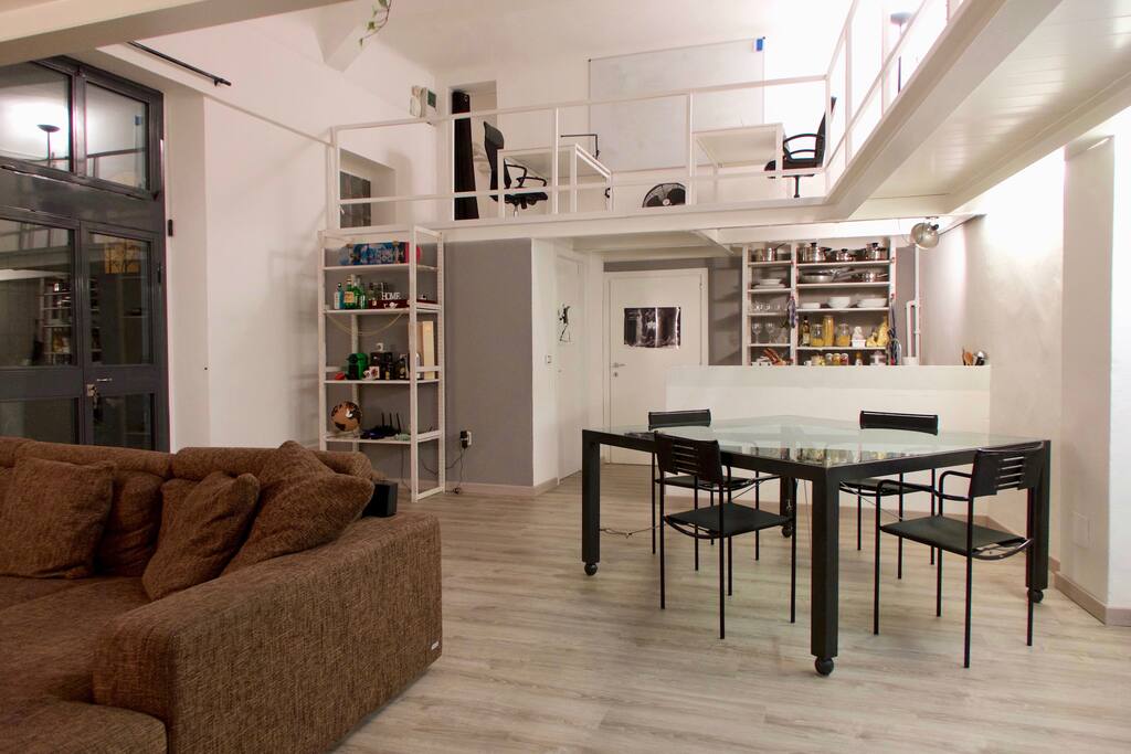Open Space Living Room with Dining Table, Kitchen and Office on the Mezzanine