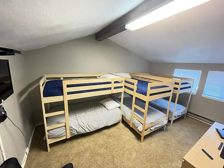The bunkroom sleeps six and is the perfect place for kids to sleep, play games, or watch tv/movies.