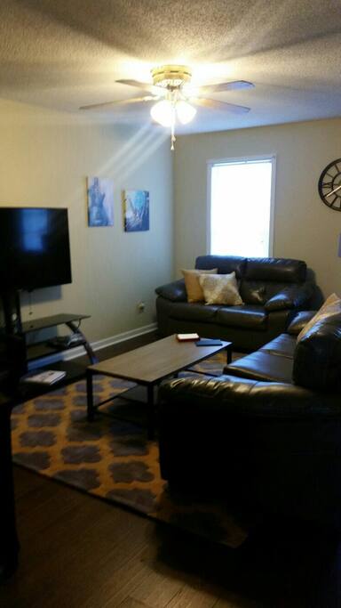 Large flat screen television and dining.