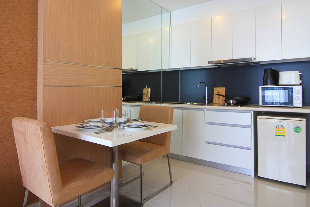 Dining with two chairs, all kitchen utensils