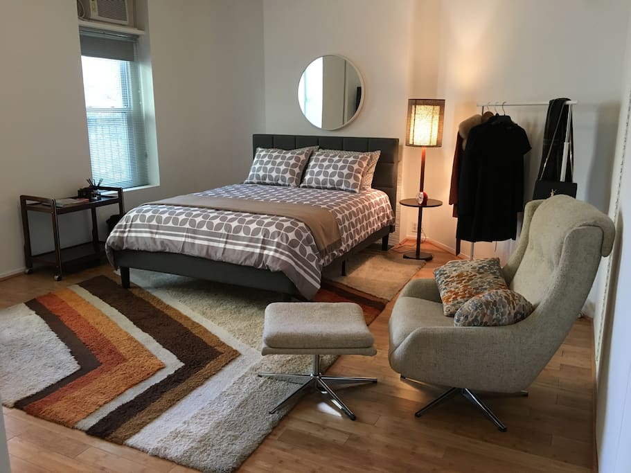 Newly renovated! Queen size bed, large reading chair and large windows
