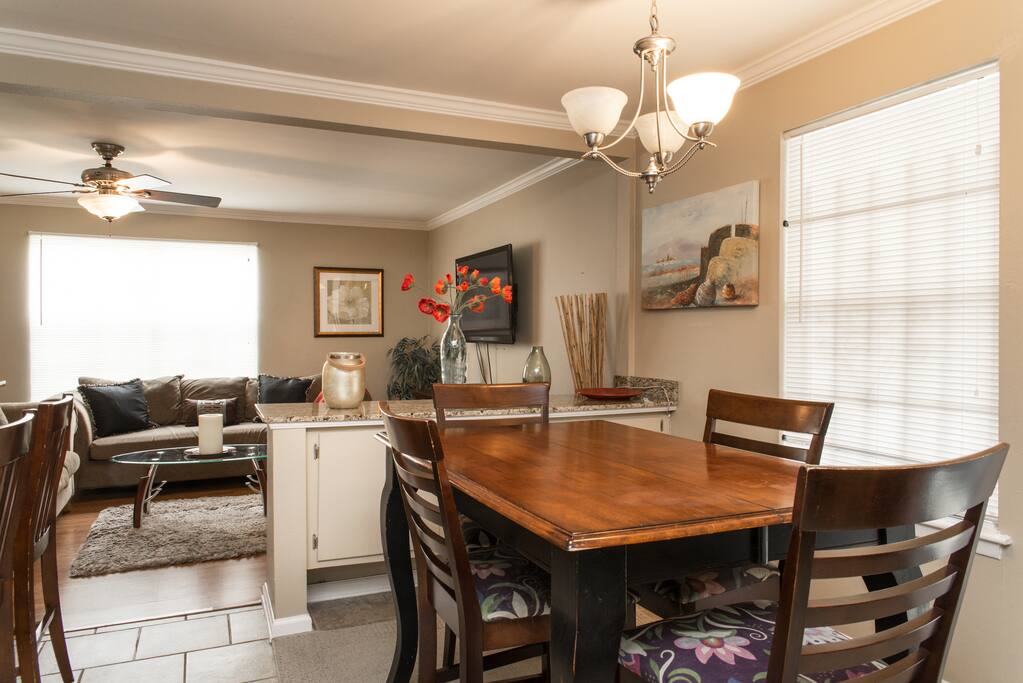 Dining room seats 6 plus 2 at the bar for comfortable meals.