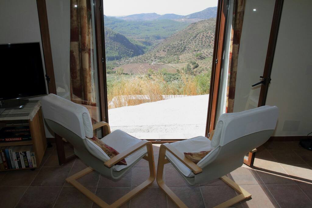 Looking out the apartment over the pool and olive groves