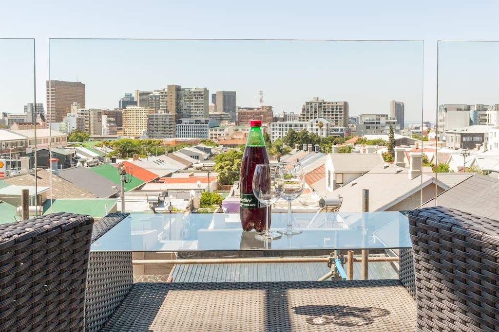 Enjoy the Summer Breeze, on your own personal balcony with a view of Cape Town City.