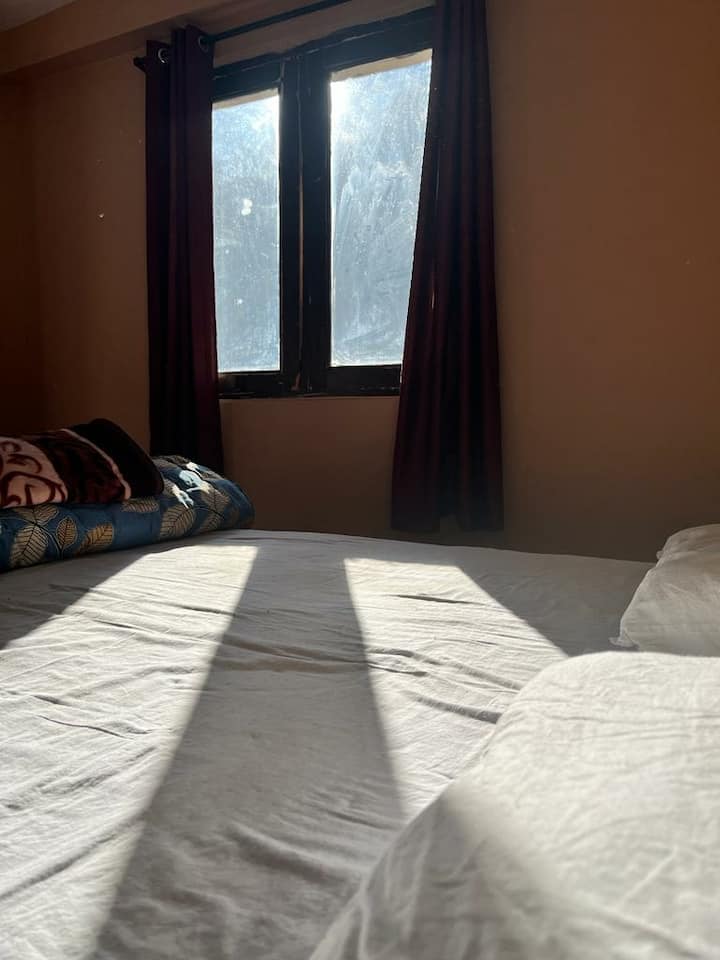 First rays of sun with the sound of chirping birds in our Sunrise View Room.