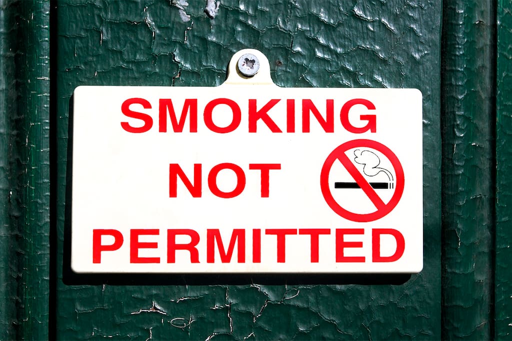 SMOKING IS NOT PERMITTED ANYWHERE,
INDOORS OR OUTDOORS, ON THE PROPERTY
- if you must smoke go outside to the street.