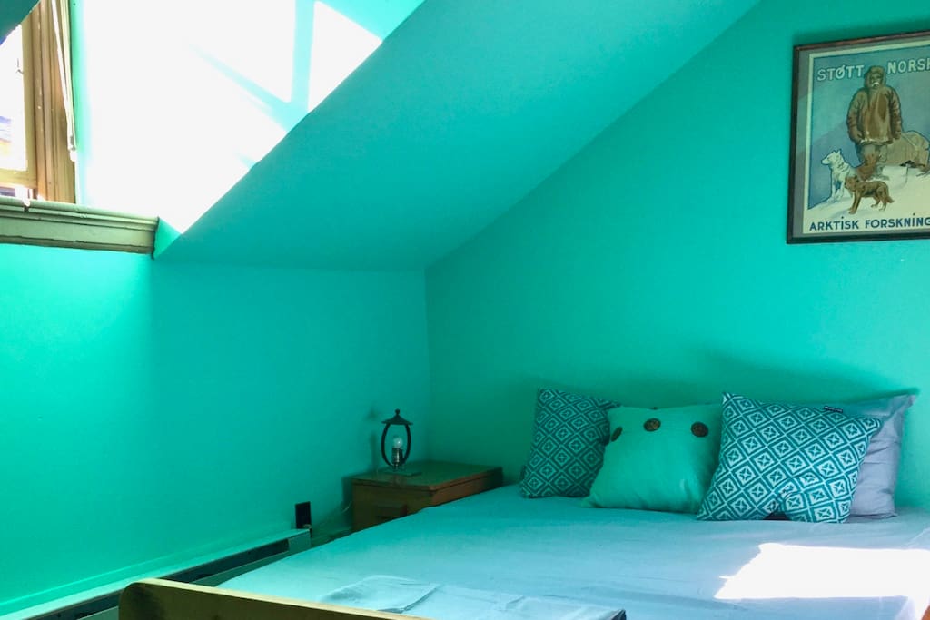 The Arctic Bedroom is drenched with soothing light and a queen sized bed for napping.