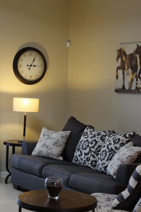 The living room has this warm glow in the evening from the sunlight and the back sliding glass doors.