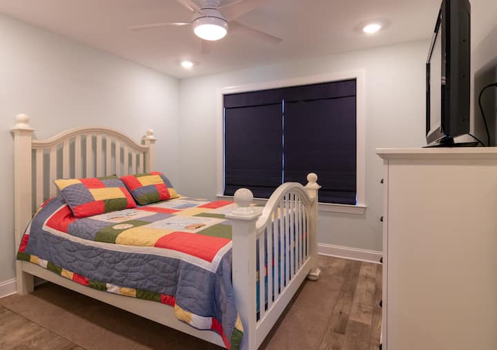 Bedroom 4 - Queen sized bed and Smart TV.