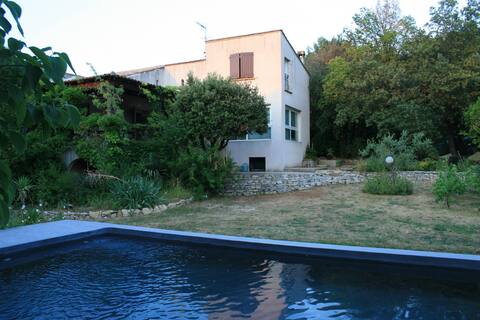 Our house surrounded by greenery