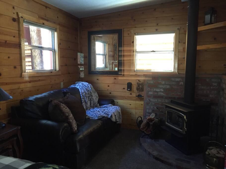 The inviting sitting area and wood stove - great place for a foot rub!