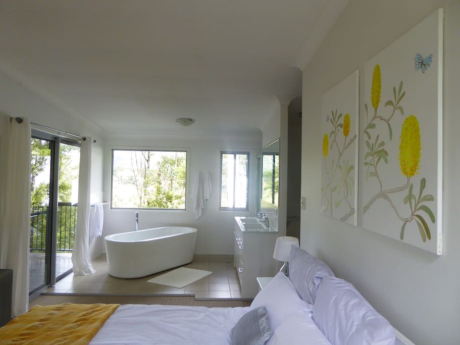Master bedroom with new paintings of banksias.