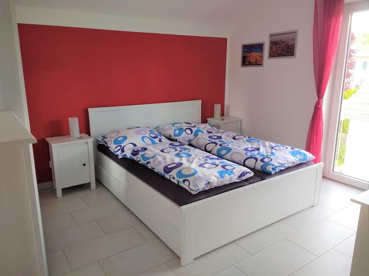 Bedroom, very bright with window doors