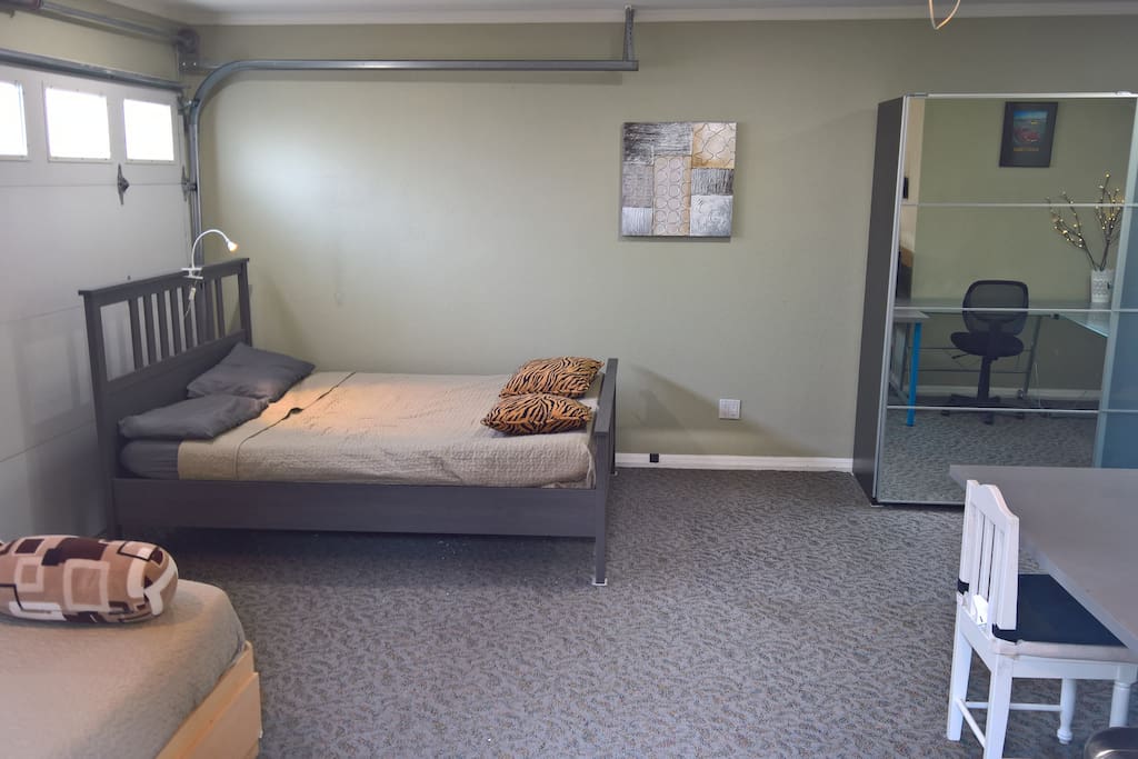 Both Beds in Room, and Standing Closet.