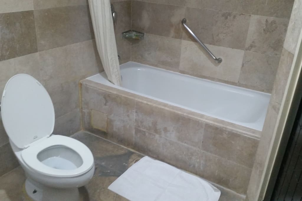 Spacious bathroom with tub