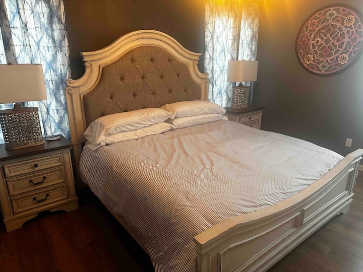 Master bedroom with attached bathroom on main floor