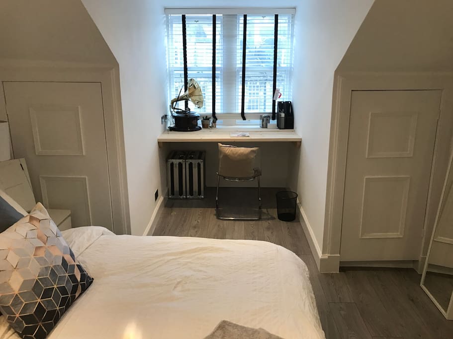 This is the office/desk space in the bedroom. The cupboards are available to store your belongings too. You can see the castle/fireworks at the tattoo from here.
