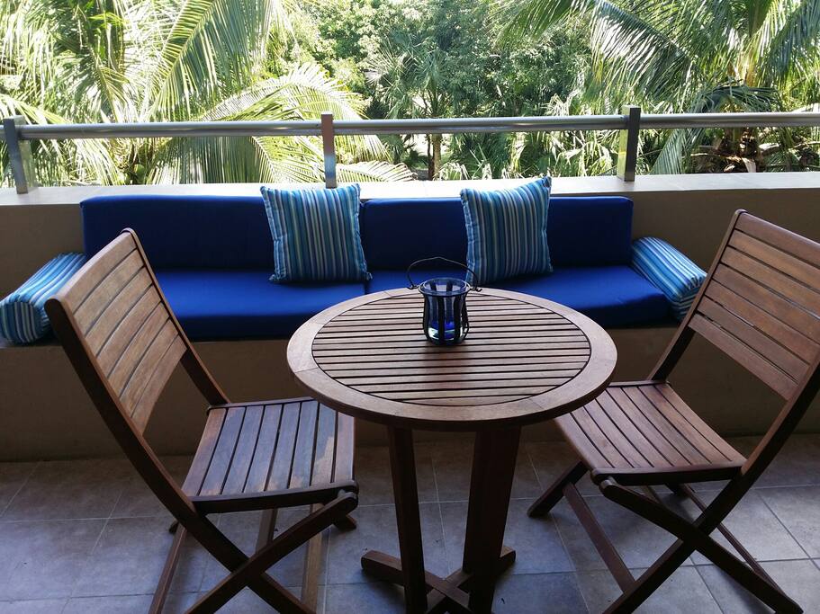 Large balcony overlooking the swimming pool