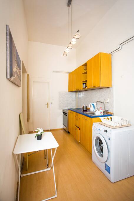 Shared kitchen with entrance to shared shower and toilet