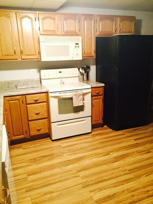 Full Kitchen w/ microwave and dishwasher