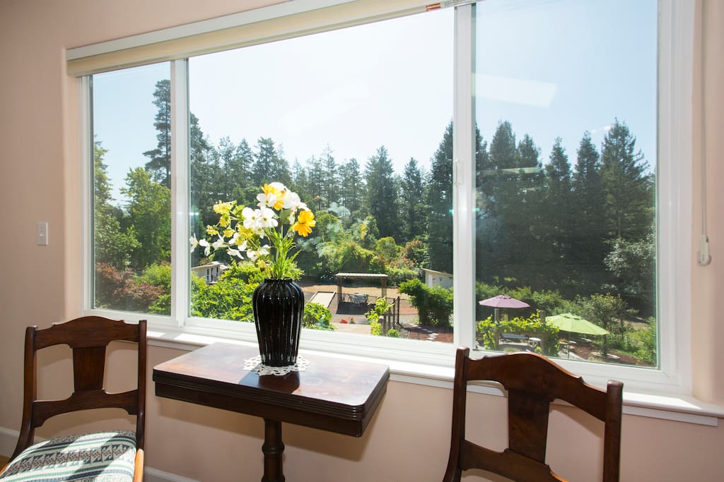 Small table to have your morning coffee overlooking the backyard.
