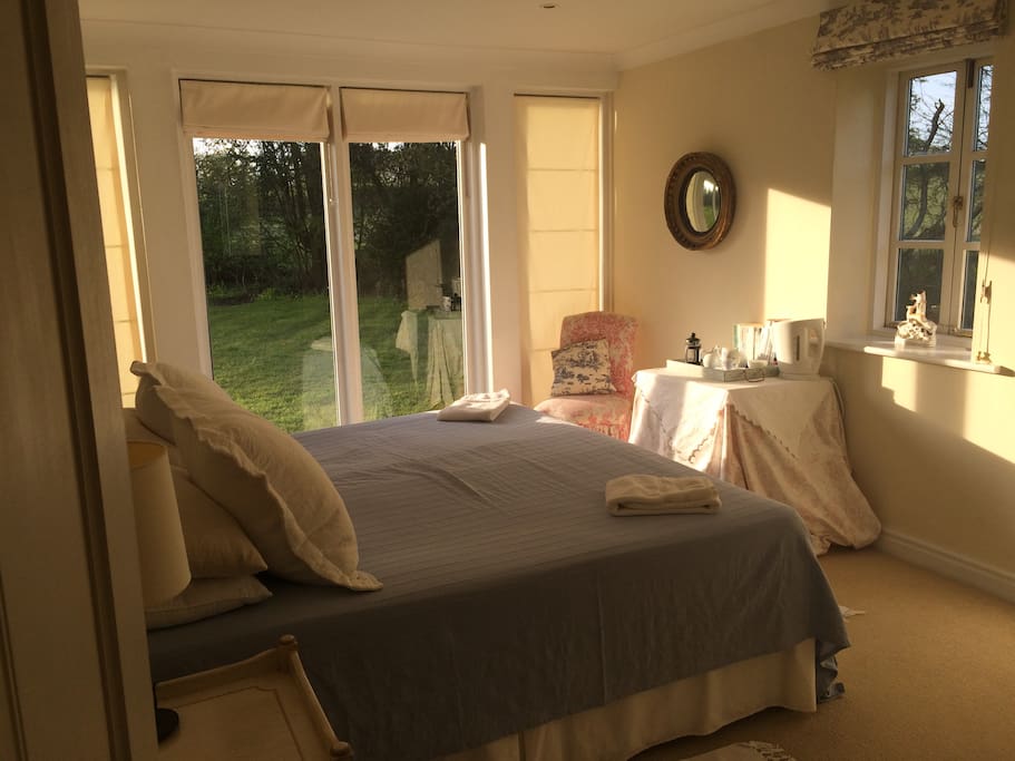 Very light and sunny room with double aspect over looking the garden.