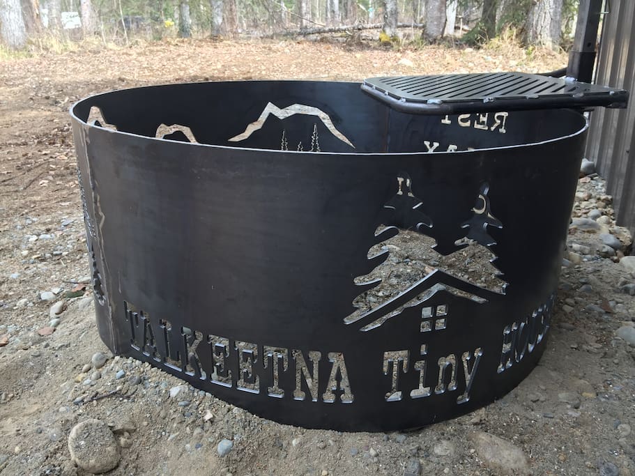 Custom fire pit with grill, and propane BBQ.