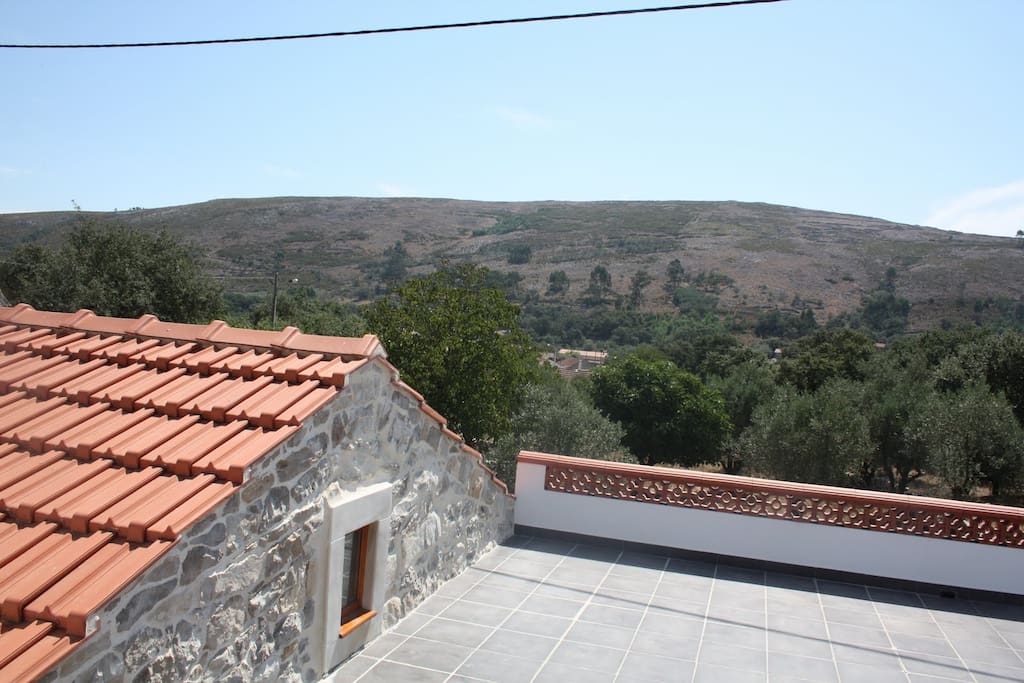 Roof terrace with stunning views across the mountains