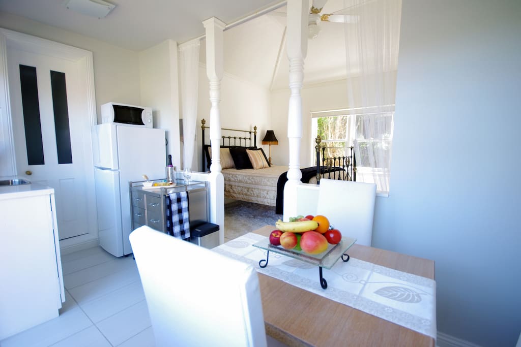 Compact yet functional. The kitchenette is more than adequate for light meals and snacks. Cutlery crockery, utensils, George Foreman etc. all hidden away.
