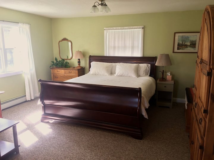 Your entirely private suite offers a king size bed, dresser, couch, dining table and chairs, and an armoire with extra blankets and pillows. It is a very private, and quiet space. 