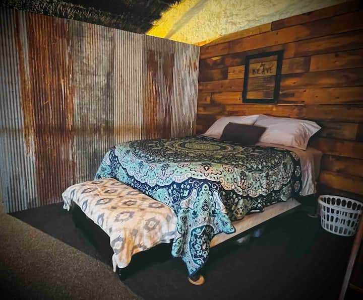 Cama tamaño queen en loft