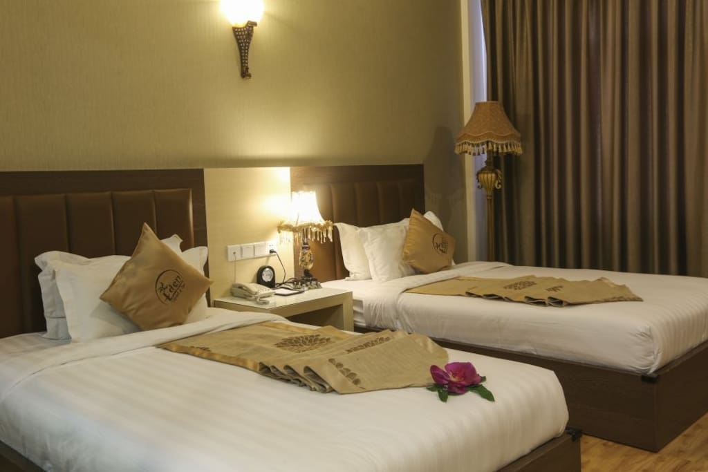 SUPERIOR
Superior room offers King or Twin size bed on the higher floors of the building, sofa, private bathtub and shower head in every room with the modern facilities ( room size is 30 square meters).
ROOM AMENITIES
- All room with bathrooms
- Air_conditioning
- LCD TV ( local channels, CNN, discovery, etc..)
- Mini_fridge in rooms
- Coffee and tea making facitities
- Complimentary bottled mineral water
- In-room safe
- IDD telephone
- Sofa in Deluxe Rooms and above
- Kitchen in Apartment
- Balcony
- HairDryer
- Highspeed Internet
- Wireless Internet
- In-Room Safe
- Double Bed
- King Bed
- Refrigerator
- Windows Open
- Cable/Satellite TV
