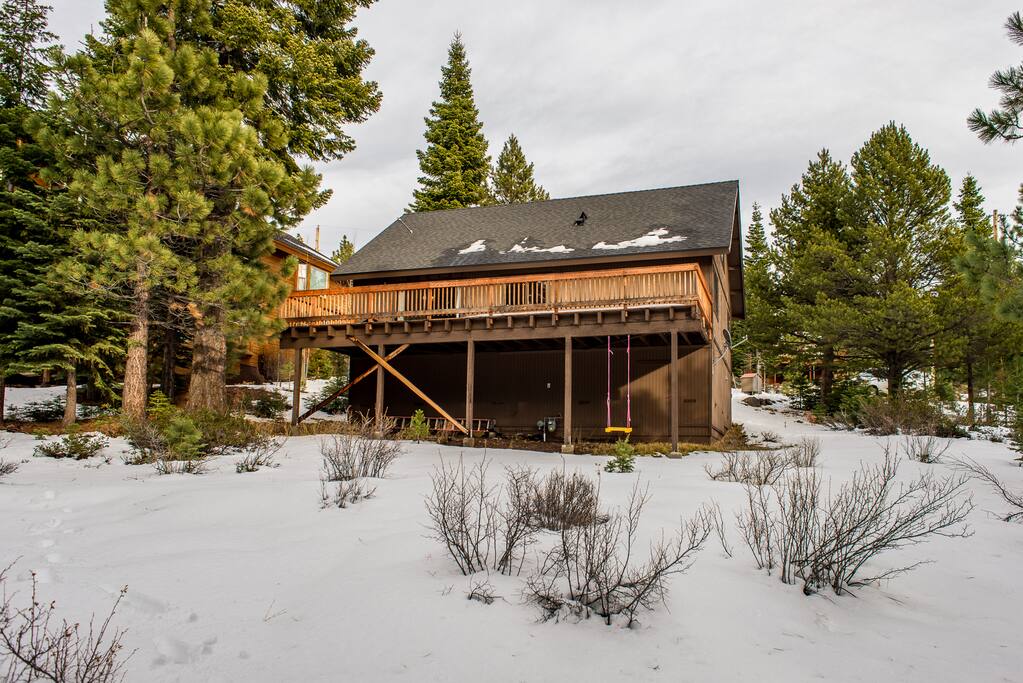 Enjoy a large yard and spacious deck with scenic views.