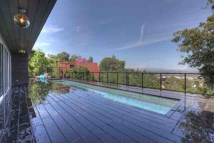 Incredible view with pool & spa in a chic home. gallery image 4