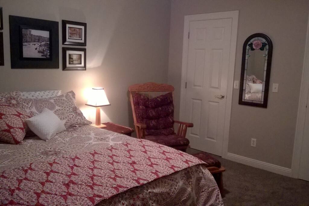Private guest room off upstairs loft with walk-in closet.