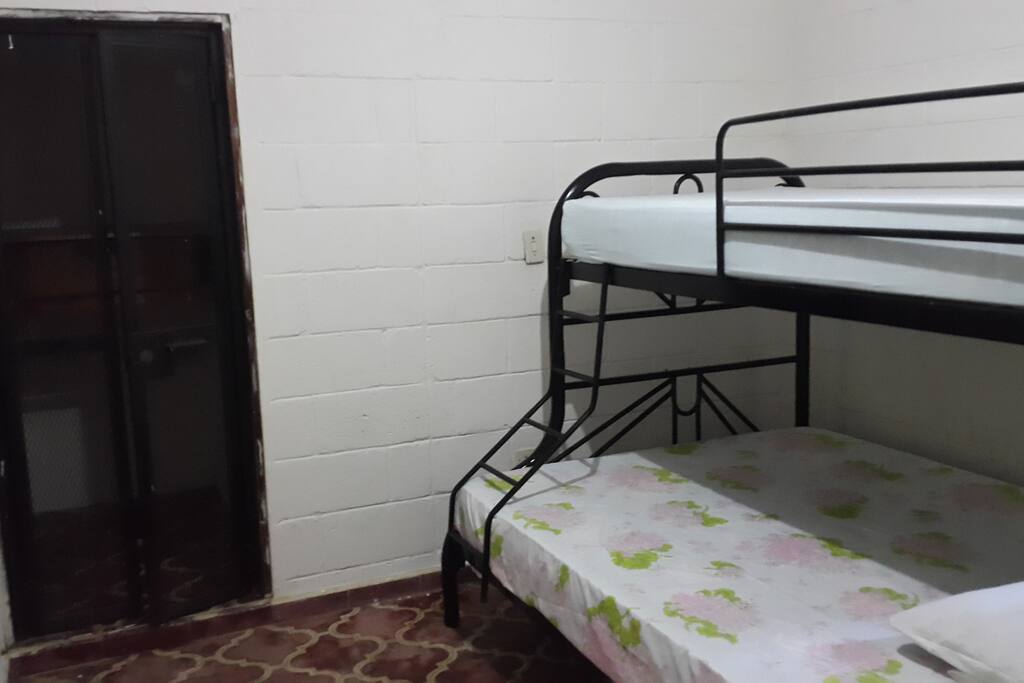 Room has a bunker bed and a closet, bottom bed is big enough for a couple.