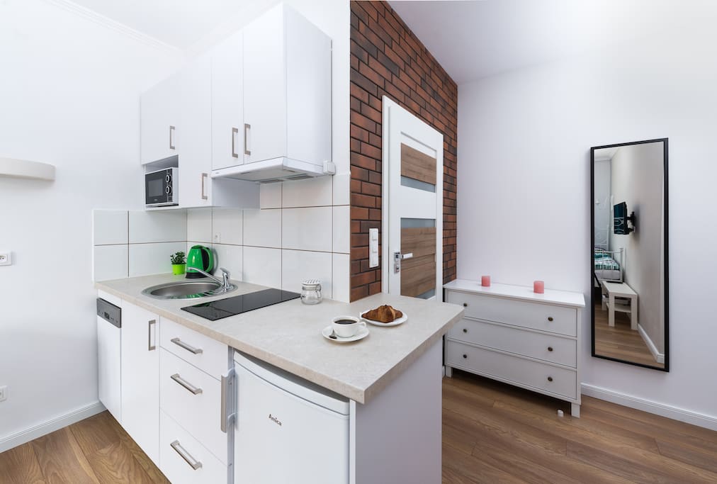 Entrance to the Apartment and the Kitchenette