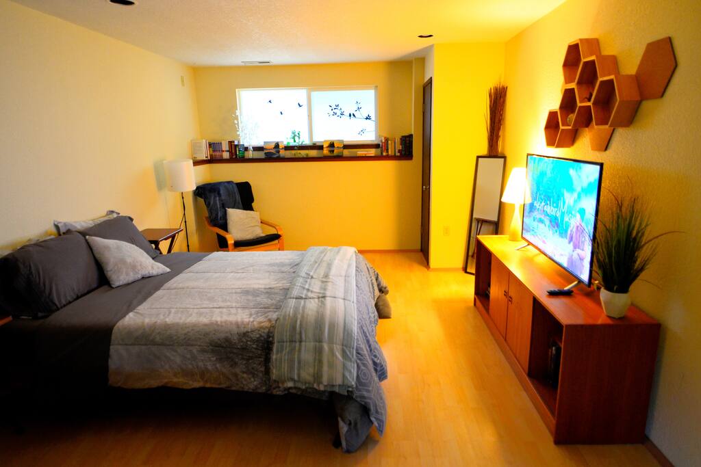 Your private, spacious sleeping area in 800 square-feet of studio suite on the lower floor of the