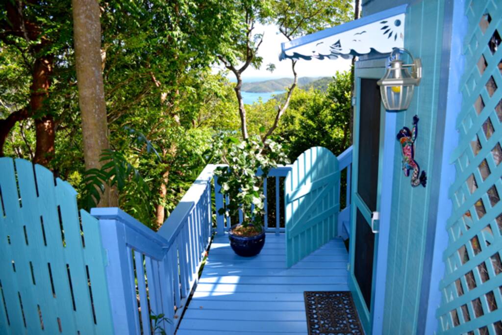 A short staircase leads to the front door of the Lower Level