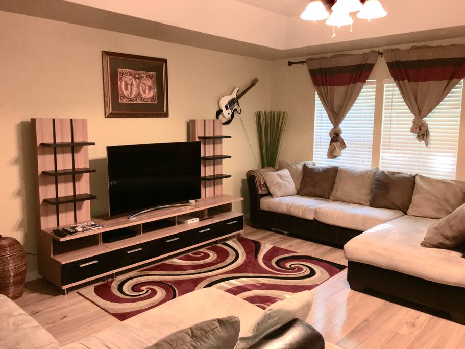 65" Samsung Curved LCD TV, Direct TV, Blue Ray/DVD Player for movie night and Nintendo Wii with Netflix access.