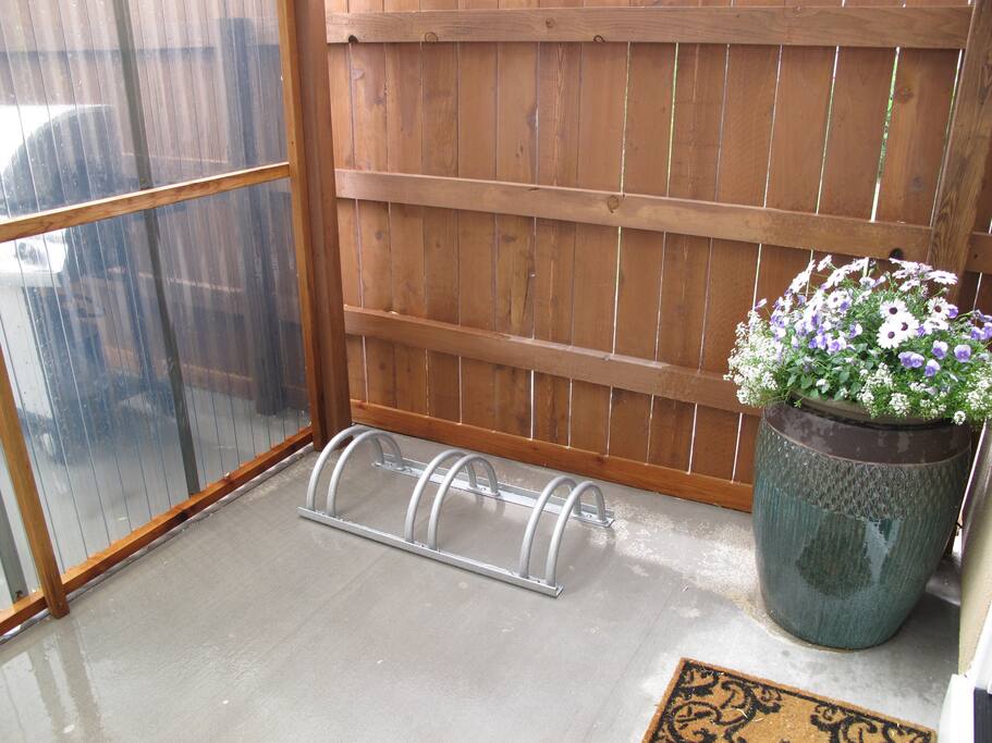 Secure, covered bike storage right at the door