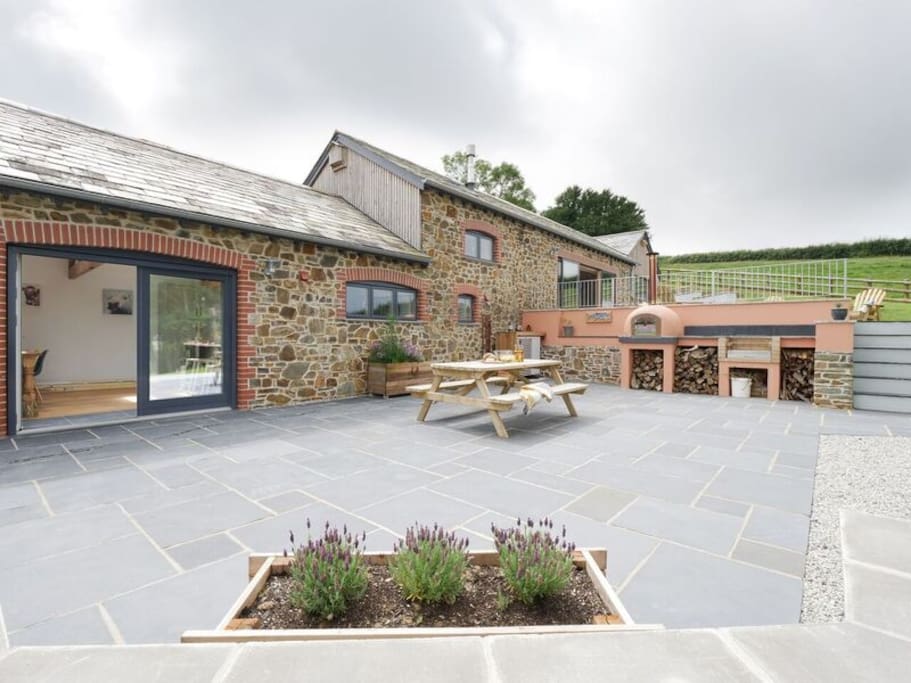 A beautiful outdoor space to enjoy homemade pizza or BBQ and maybe even a cheeky drink.