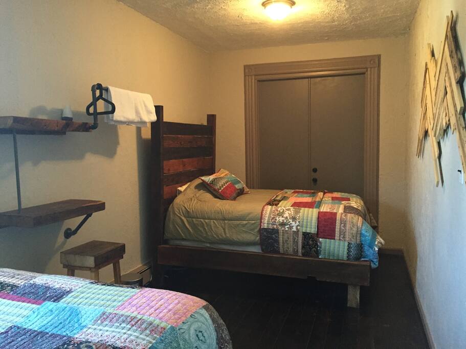 This room has two beautiful hand crafted full size beds made by the LaTorre Family!