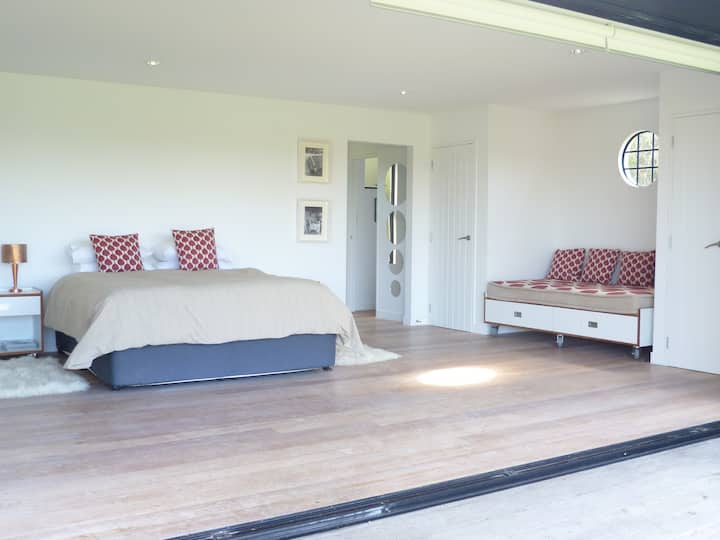 View with extra large single bed to the right